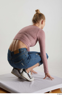 Kate Jones  1 blue jeans casual dressed kneeling pink…